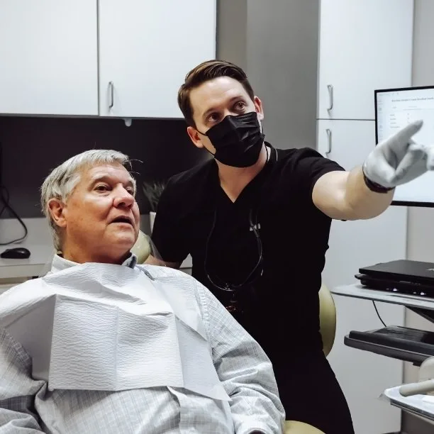 Dentist with patient